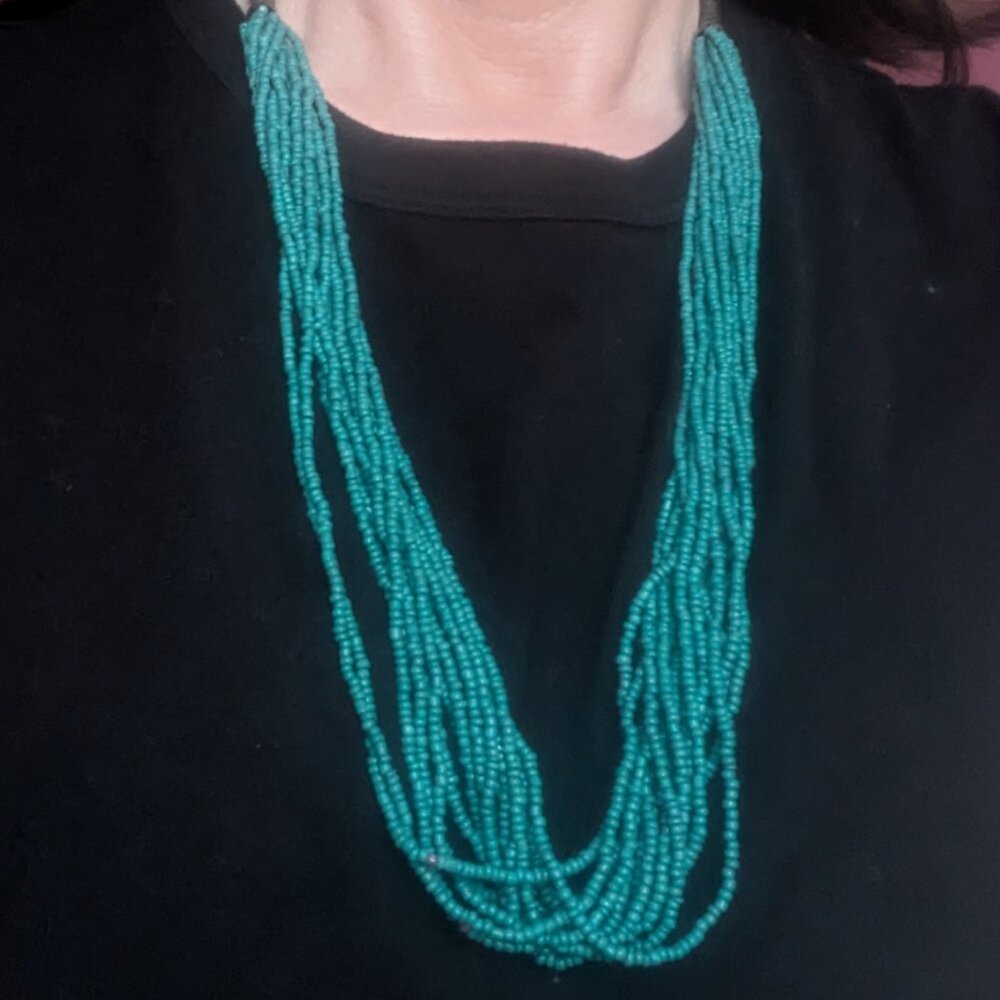 Multi strand teal beaded necklace brass closer